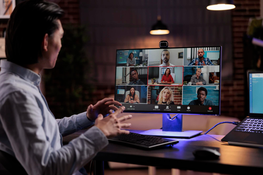 Diverse company employees having online business conference